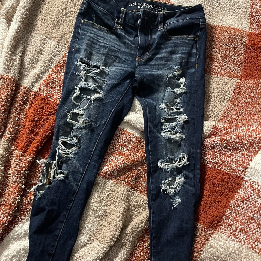 dark destroyed american eagle skinny jeans or jeggings size 2